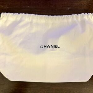 CHANEL White Drawstring Bag